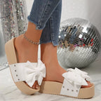 Women's chic bow decor platform sandals by Trendsi, comfortable flat walking shoes with stylish bow detail and open toe design.