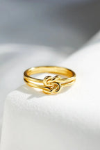 925 Sterling Silver Knotted Ring with intricate design, showcasing polished silver and elegant knot detail.
