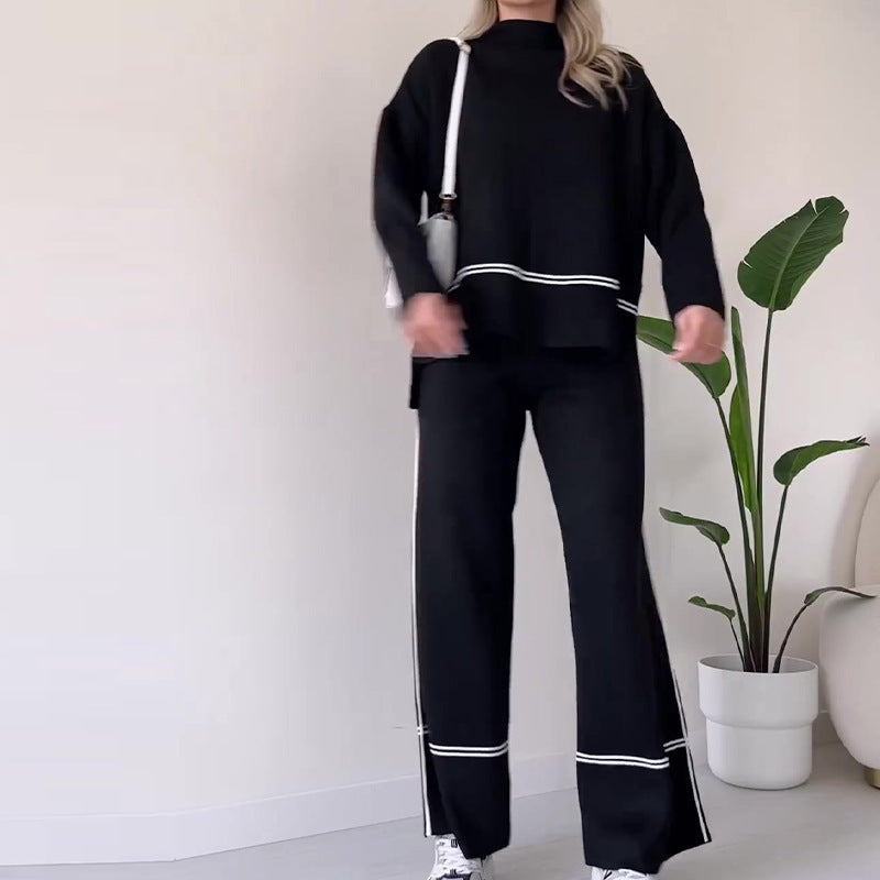 Women’s casual two-piece set by FitiqueFit featuring a loose top and bootcut pants in solid color.