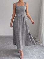 Square neck gingham midi dress by Shopimist featuring a fitted bodice and flowing skirt in classic black and white gingham fabric.