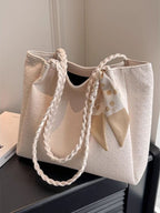 Shopimist braided handle tote bag with sturdy woven straps, spacious interior, perfect for everyday use and stylish carrying.