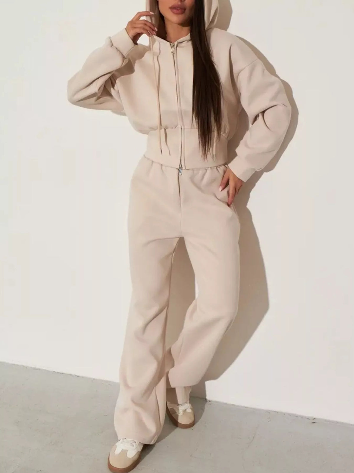 Plush Fashion Hub zip-up hoodie and wide-leg pants loungewear set, soft fabric, comfortable fit, in neutral tones.