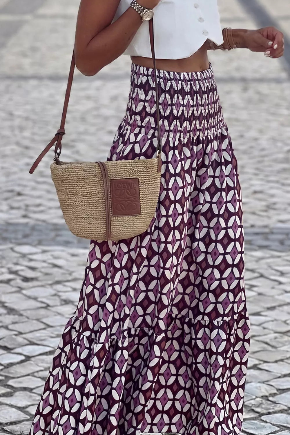Plush Fashion Hub geometric print smocked waist maxi dress with flowing fabric and stylish design.