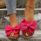 Shopimist bowknot embellished flat sandals with stylish design and open toe, ideal for casual summer wear.