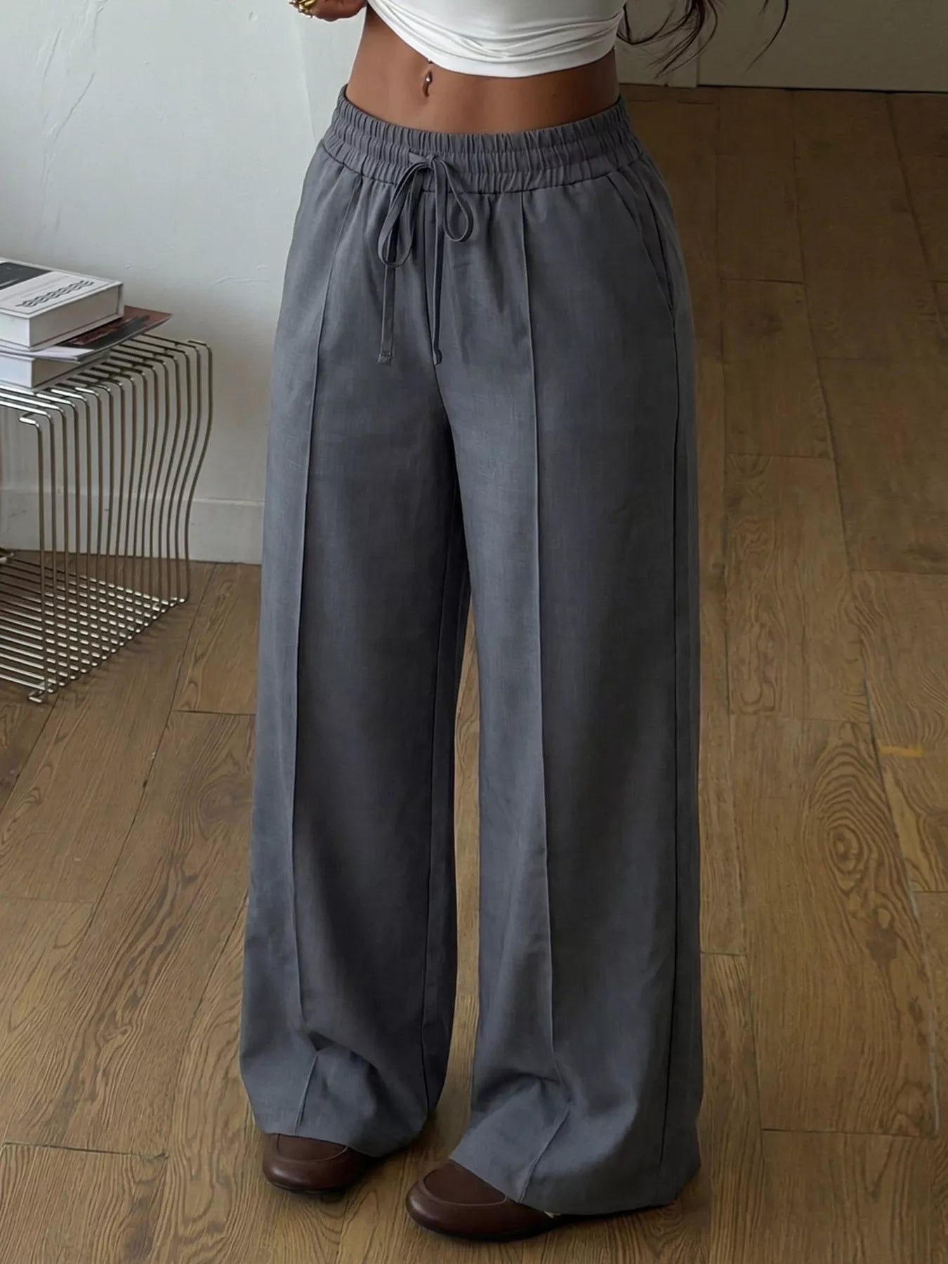 Plush Fashion Hub high-waisted wide-leg drawstring pants in soft fabric, shown in a relaxed fit style.
