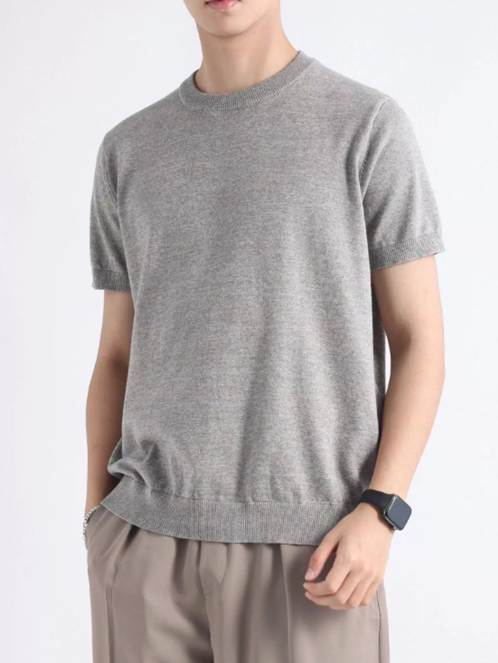 Plus size men's casual knitted short sleeve T-shirt from Trendsi, featuring a comfortable fit and classic design.