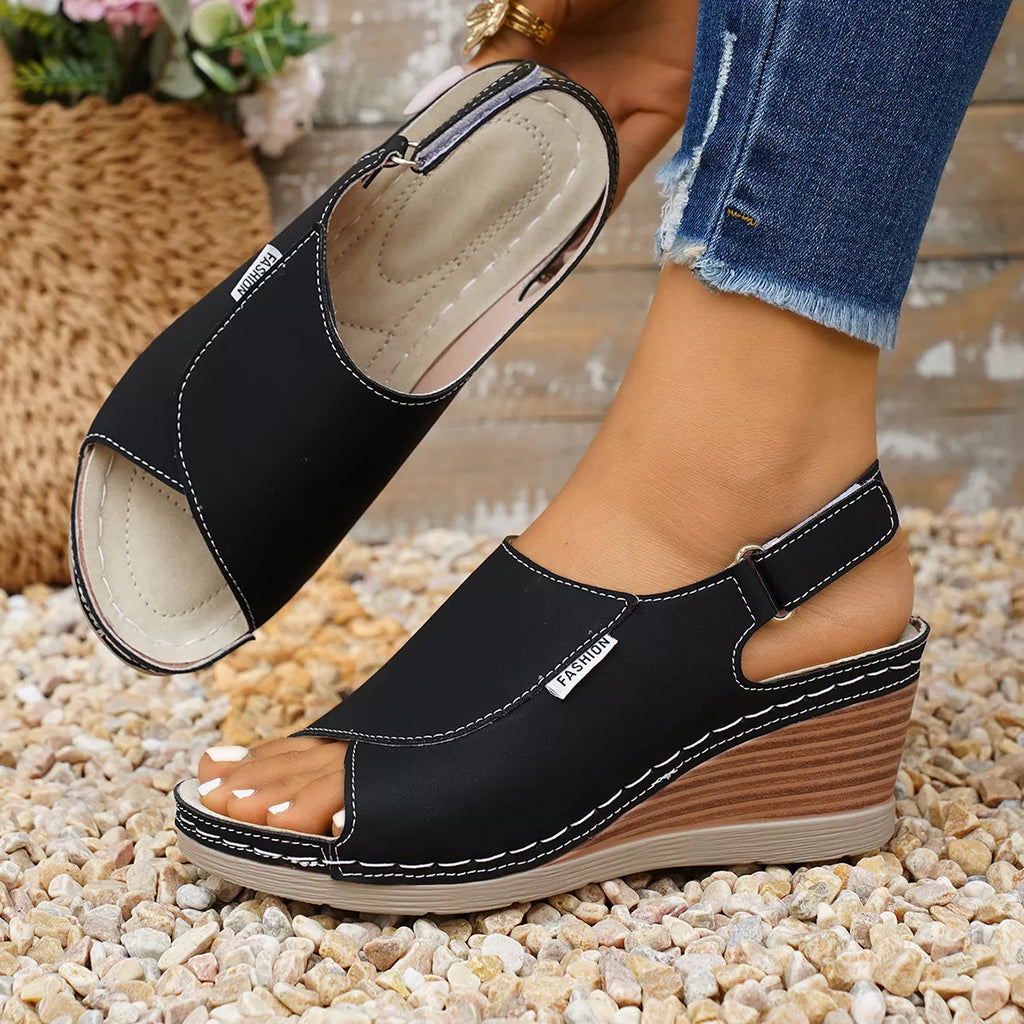 Shopimist peep toe wedge sandals with chunky heels, open toe design, and stylish straps on a white background.