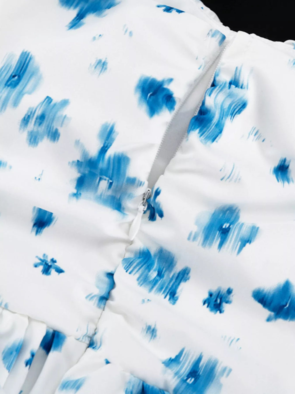Floral print ruffle hem tank top from Shopimist, lightweight sleeveless blouse with a feminine ruffled hem and vibrant floral pattern.