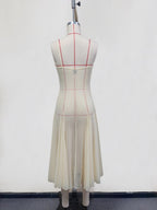 Floral embellished spaghetti strap dress by Shopimist featuring delicate floral details and lightweight fabric.