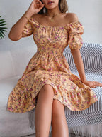 Floral puff sleeve dress with ruffled hem from Shopimist, featuring a feminine design and lightweight fabric.