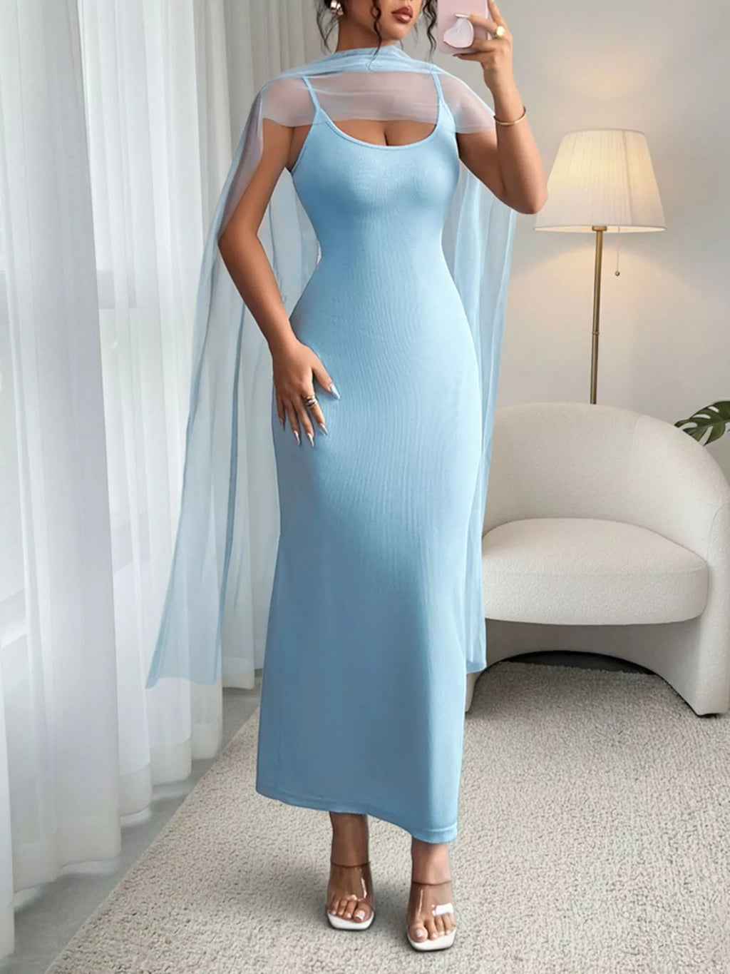 Women's ribbed scoop neck bodycon maxi dress by Trendsi, elegant stretch floor-length dress with a fitted silhouette and sleeveless design.