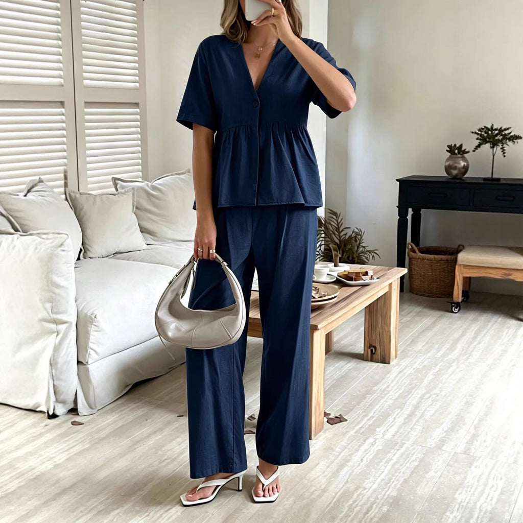 Women's casual FitiqueFit V-neck loose short-sleeve top and wide-leg pants set displayed on a model.