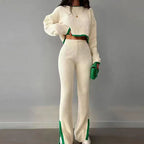 Women’s casual color-block two-piece set by Plush Fashion Hub, featuring a stylish top and matching pants in vibrant hues.