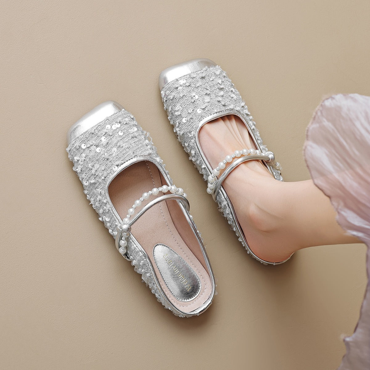 Pearl-embellished minimalist slide sandals by Plush Fashion Hub featuring sleek design and comfortable flat sole.