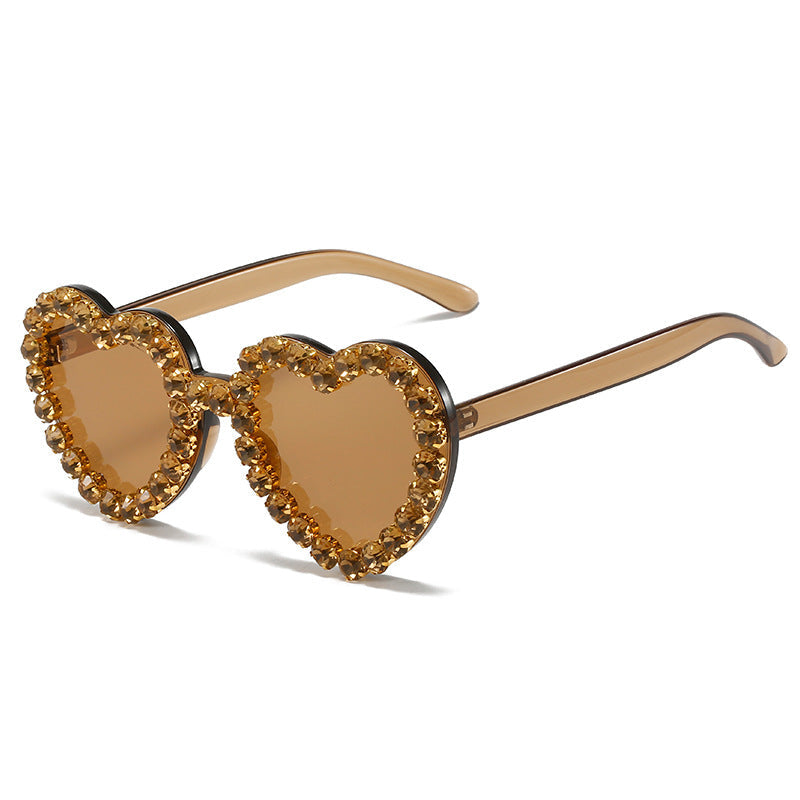 Peach heart-shaped rhinestone sunglasses in Y2K INS style, trendy eyewear by Plush Fashion Hub with sparkling rhinestone details.