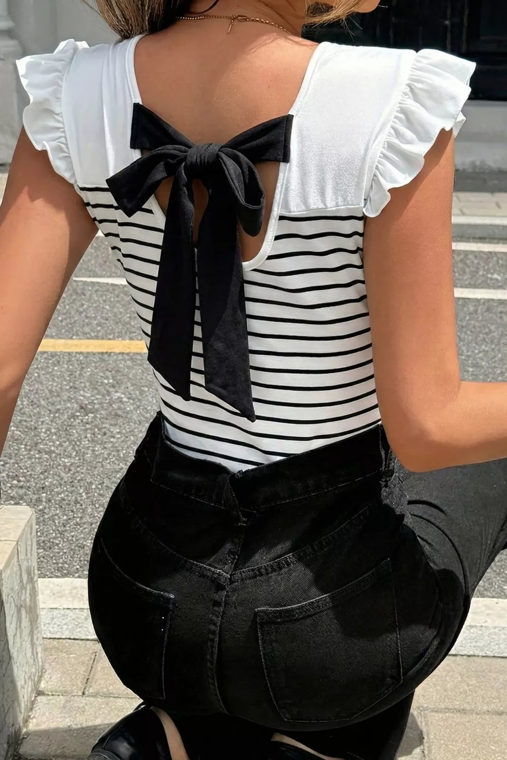 Stripe contrast knot back ruffle trim tank top by Plush Fashion Hub, featuring a stylish knot back and ruffle details.