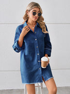 VYSN raw hem button-up denim dress displayed on a hanger, showcasing casual, stylish denim fashion for women.