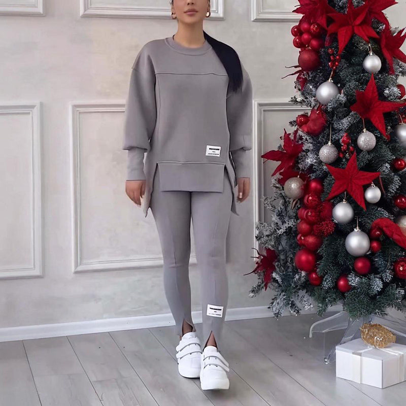 Women's solid color 2-piece casualwear set by Plush Fashion Hub, featuring a matching top and pants on a neutral background.