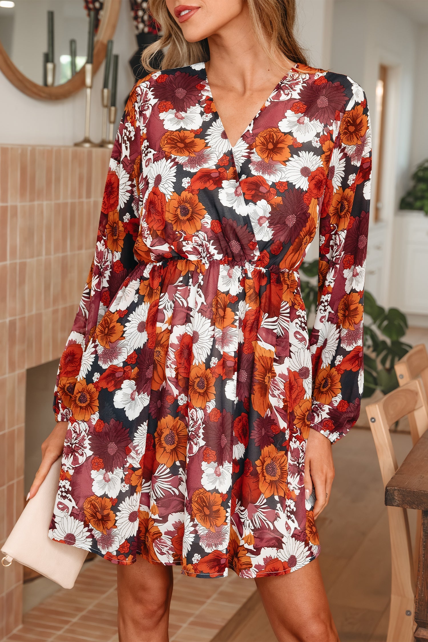 Floral Marianna Sleeve Flowy Mini Dress by Threaded Pear featuring a lightweight, breezy design and floral pattern.