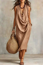 Sleeveless drape neck midi dress by Shopimist featuring a flowing silhouette and elegant design, perfect for stylish occasions.