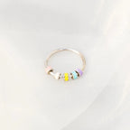 925 Sterling Silver Oil Drip Ring featuring a sleek, modern design with a polished finish and delicate band.