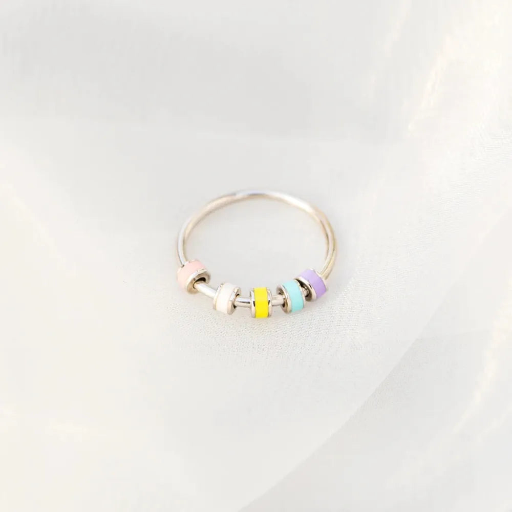 925 Sterling Silver Oil Drip Ring featuring a sleek, modern design with a polished finish and delicate band.