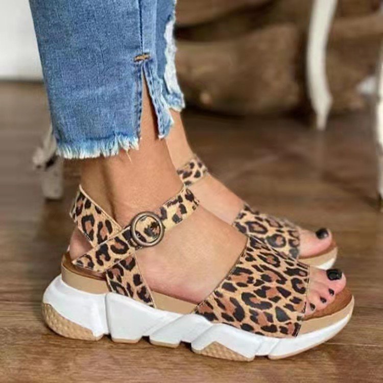 Leopard print platform Roman sandals from Plush Fashion Hub featuring casual style and open-toe design with ankle straps.