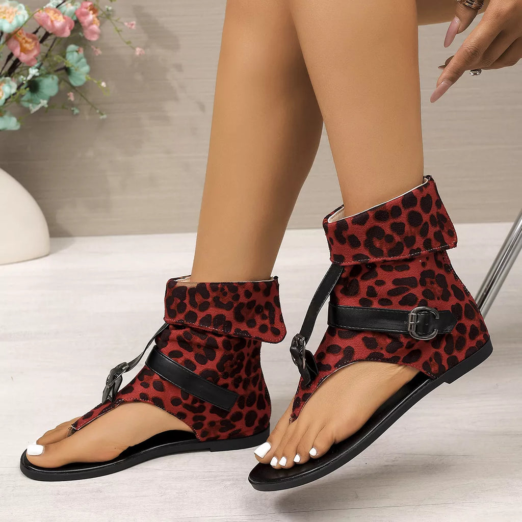 Leopard print toe post sandals by Shopimist with slim straps and flat sole, perfect for casual summer wear.