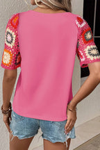 Plush Fashion Hub geometric print round neck short sleeve blouse with stylish design, ideal for casual or office wear.