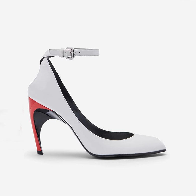Colorblock pointed-toe stiletto heels with buckle detail from Plush Fashion Hub, stylish and modern women's footwear.