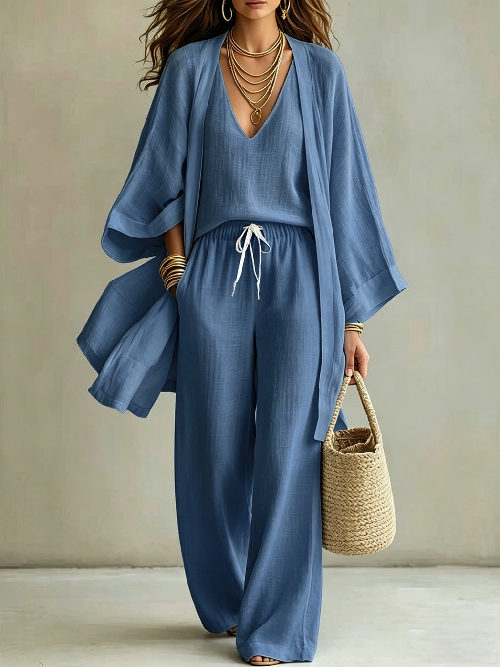 Women's 3-piece cardigan, sleeveless vest, and wide-leg pants set by Plush Fashion Hub, featuring a stylish, coordinated outfit.