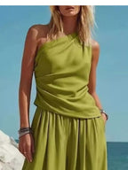 Plus size plush fashion hub one-shoulder top with wide-leg pants set, featuring a stylish, coordinated piece pants set look.