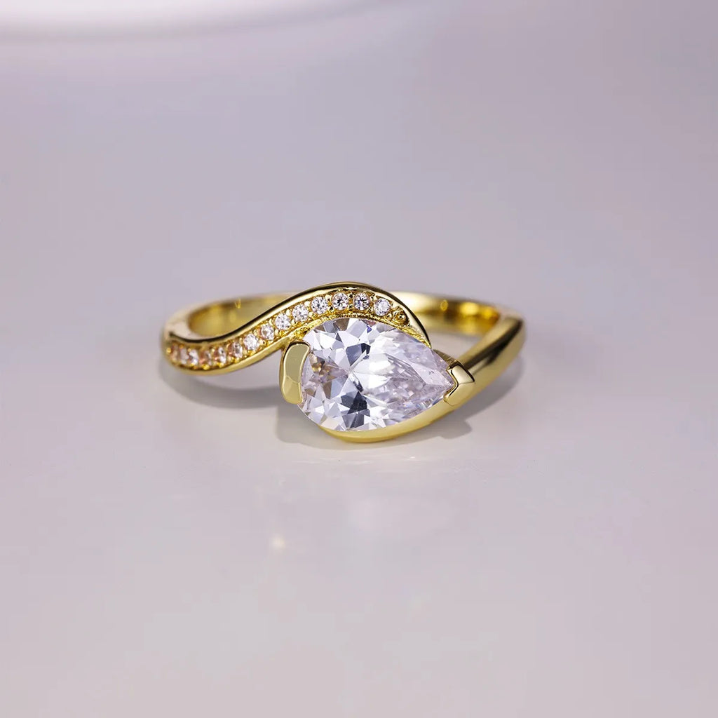 Sterling silver ring with 1.5 carat Moissanite gemstone, showcasing a sparkling, round-cut center stone and elegant band design.