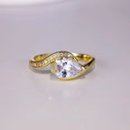 Sterling silver ring with 1.5 carat Moissanite gemstone, showcasing a sparkling, round-cut center stone and elegant band design.
