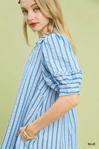 Striped Umgee puff sleeve midi dress with a fitted waist and flowing skirt, stylish and perfect for casual or semi-formal wear.