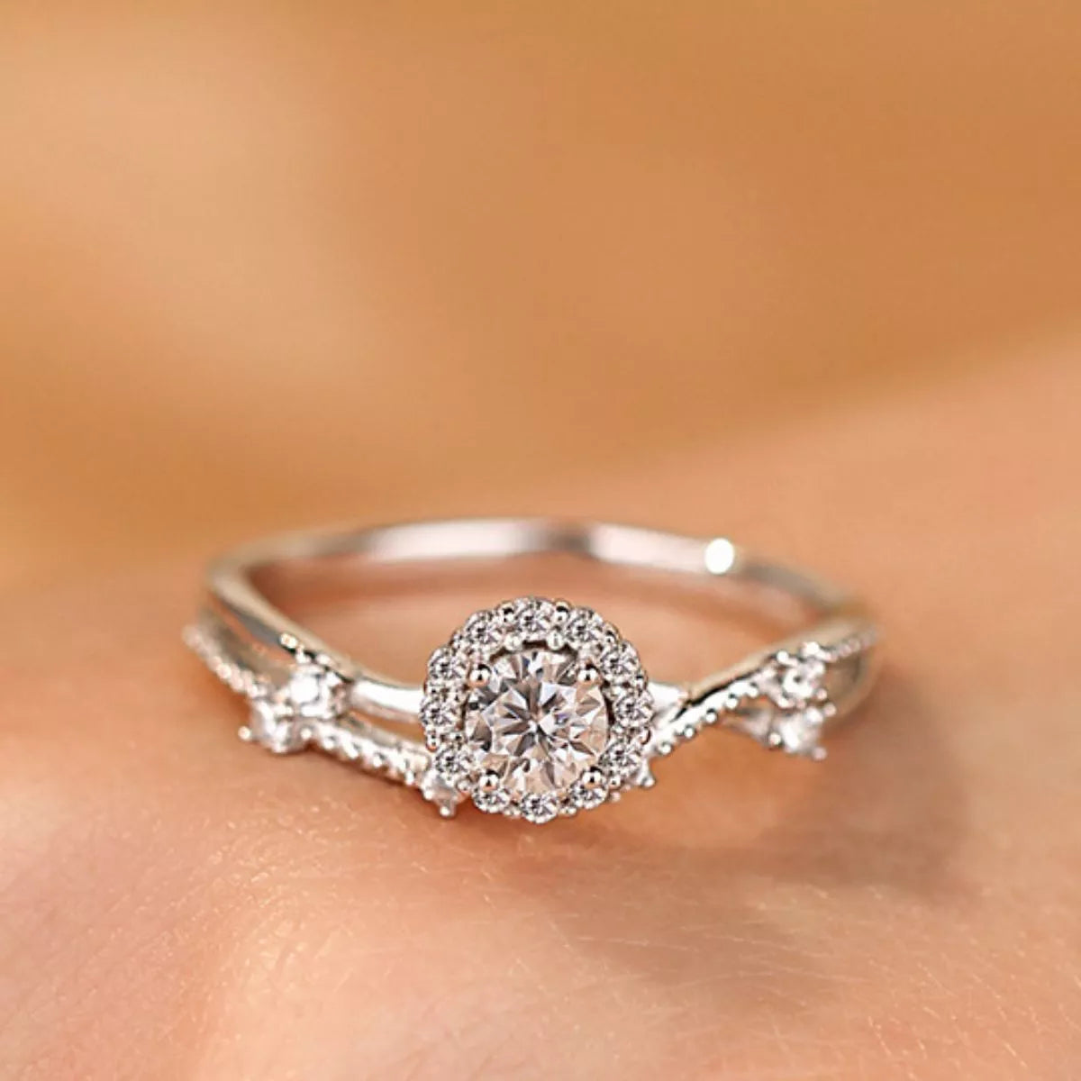 Sterling silver layered ring with a 1-carat moissanite gemstone, featuring a sleek design and sparkling stone for elegant style.