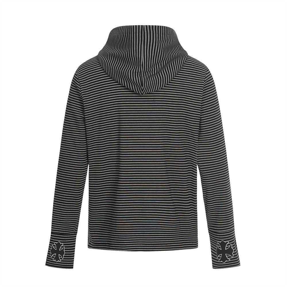 Back view of a black and white striped knit hoodie with cuffs, featuring floral patches.