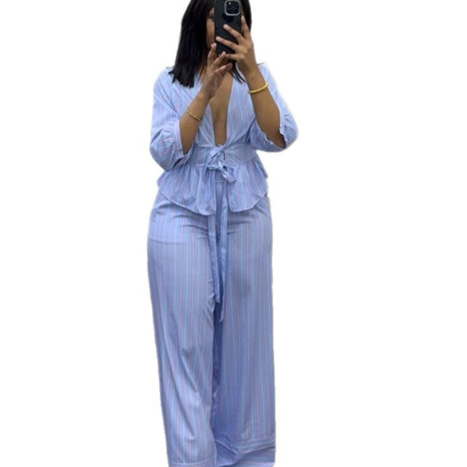Striped lace-up V-neck top set by Plush Fashion Hub featuring coastal chic style and lightweight fabric.