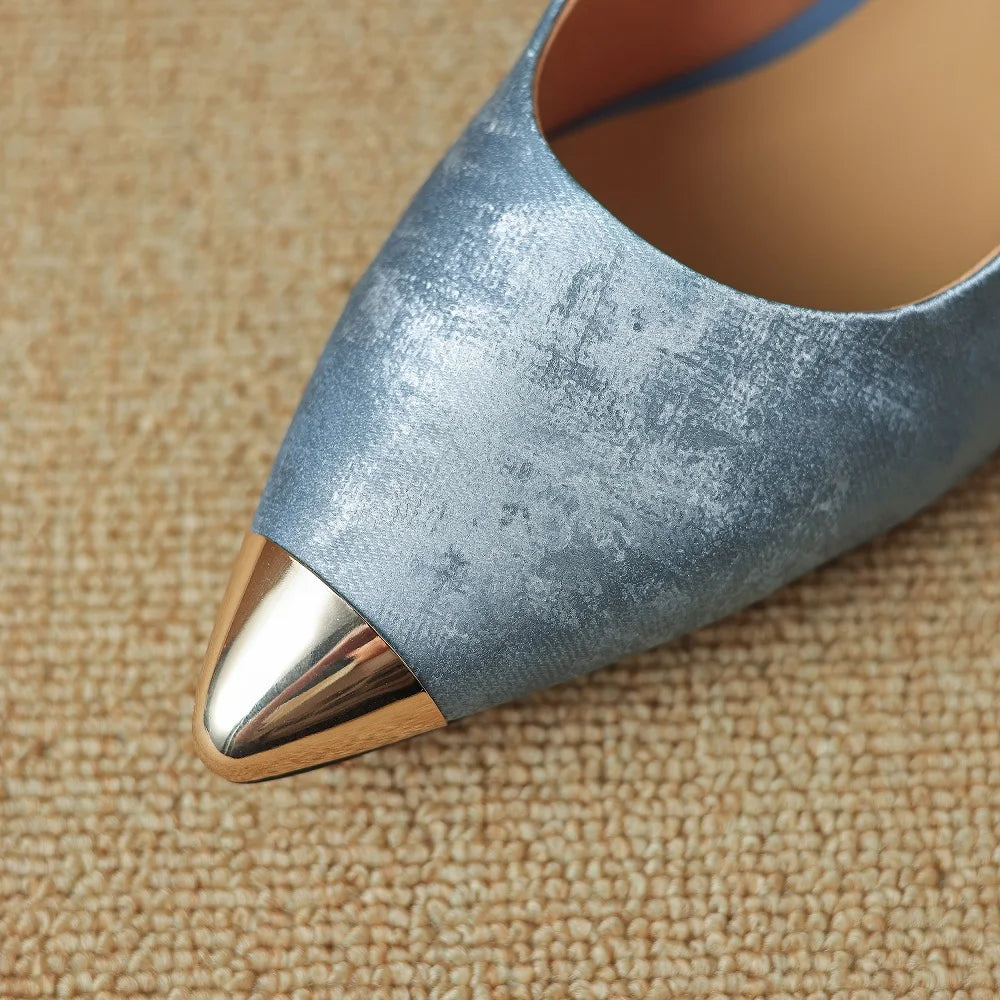 Elegant genuine leather heels with metal toe for women, stylish Plush Fashion Hub footwear featuring a sleek design.