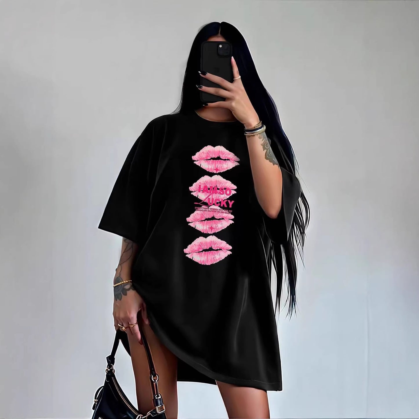 Women’s black cotton T-shirt with lip print and short sleeves, loose fit from Plush Fashion Hub.