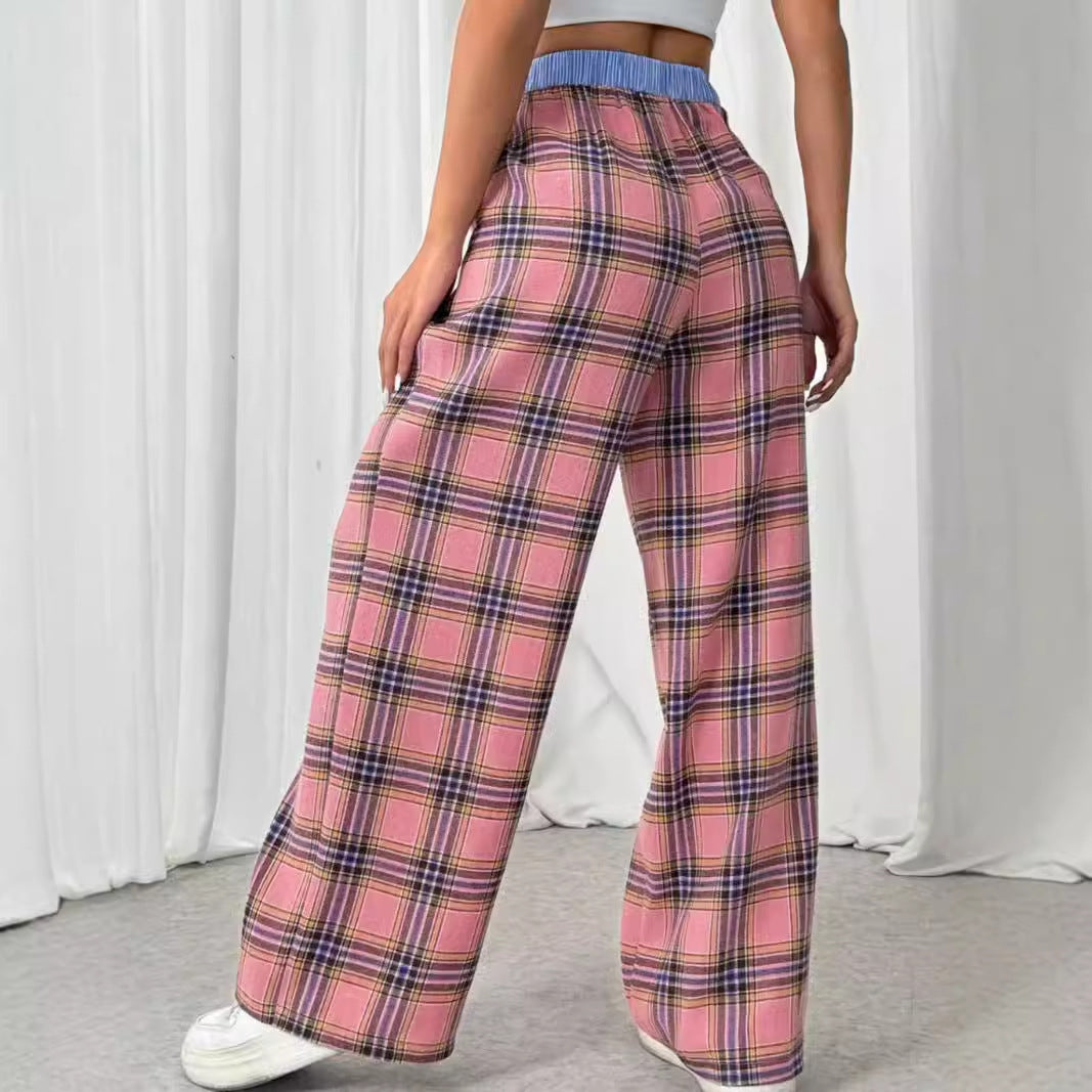 Eprolo straight loose pants in neutral fabric, featuring a relaxed fit and minimalist design, displayed on a hanger.