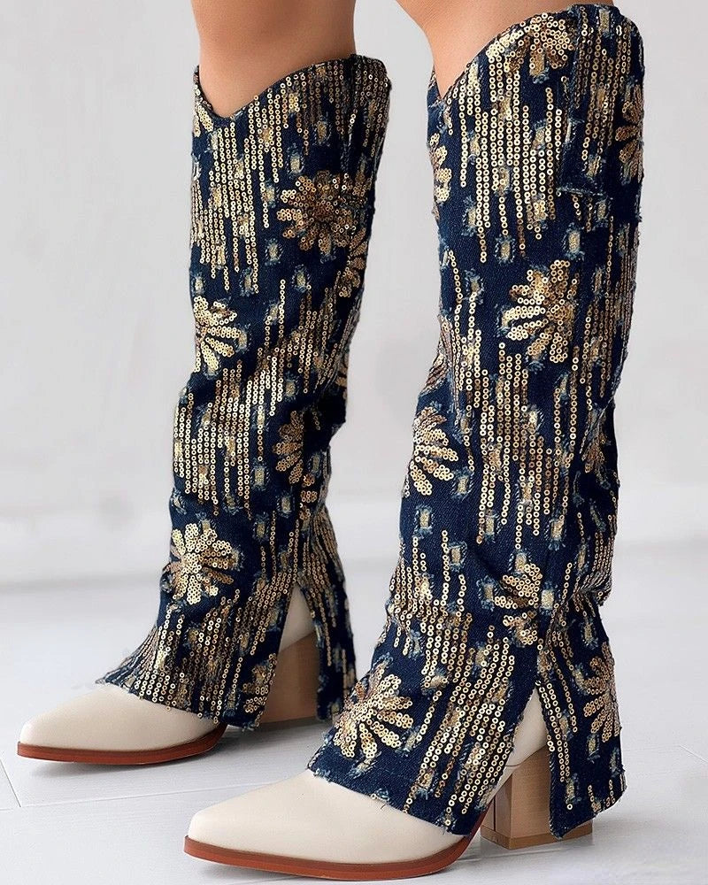 Knee-high denim boots with gold sequin floral pattern over white leather pointed-toe block-heel boots.