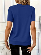 Women's ribbed half zip short sleeve casual top by Trendsi, soft stretch pullover with ribbed texture and short sleeves.