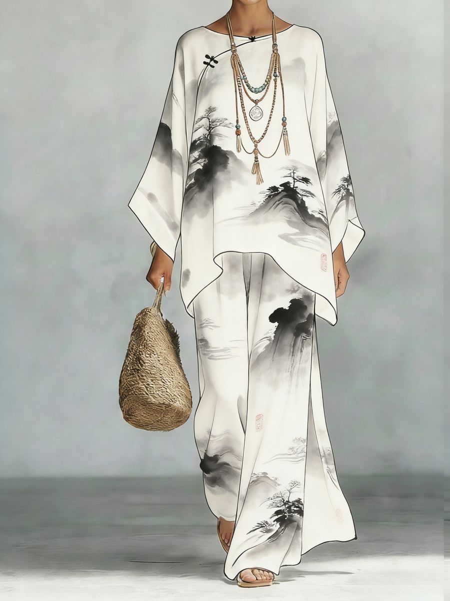 Floral print bamboo linen two-piece set with wide-leg pants by FitiqueFit, featuring a vibrant floral top and relaxed matching pants.