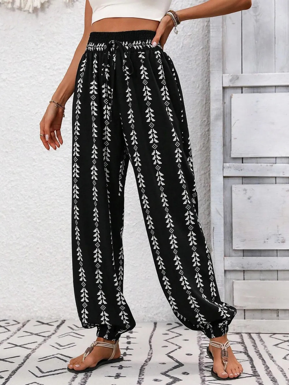 Plush Fashion Hub printed high-waist pants displayed on a model, featuring a stylish design and comfortable fit.