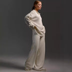Women’s fall winter casual two-piece set by FitiqueFit featuring a loose collar sweater and matching pants, ideal for cozy everyday wear.