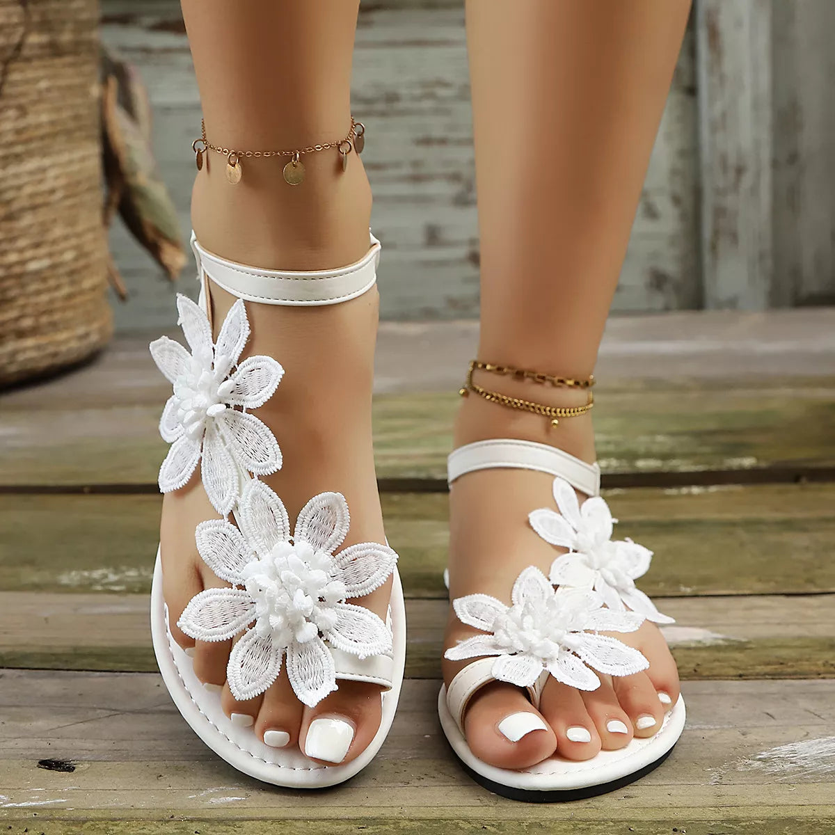 Floral embellished flat sandals by Shopimist featuring colorful flower accents and open toe design.