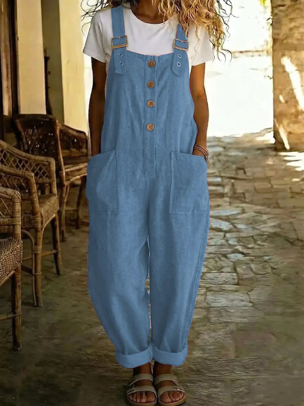 Casual button-front wide-leg overalls by Shopimist featuring a relaxed fit and adjustable shoulder straps, shown on a model.