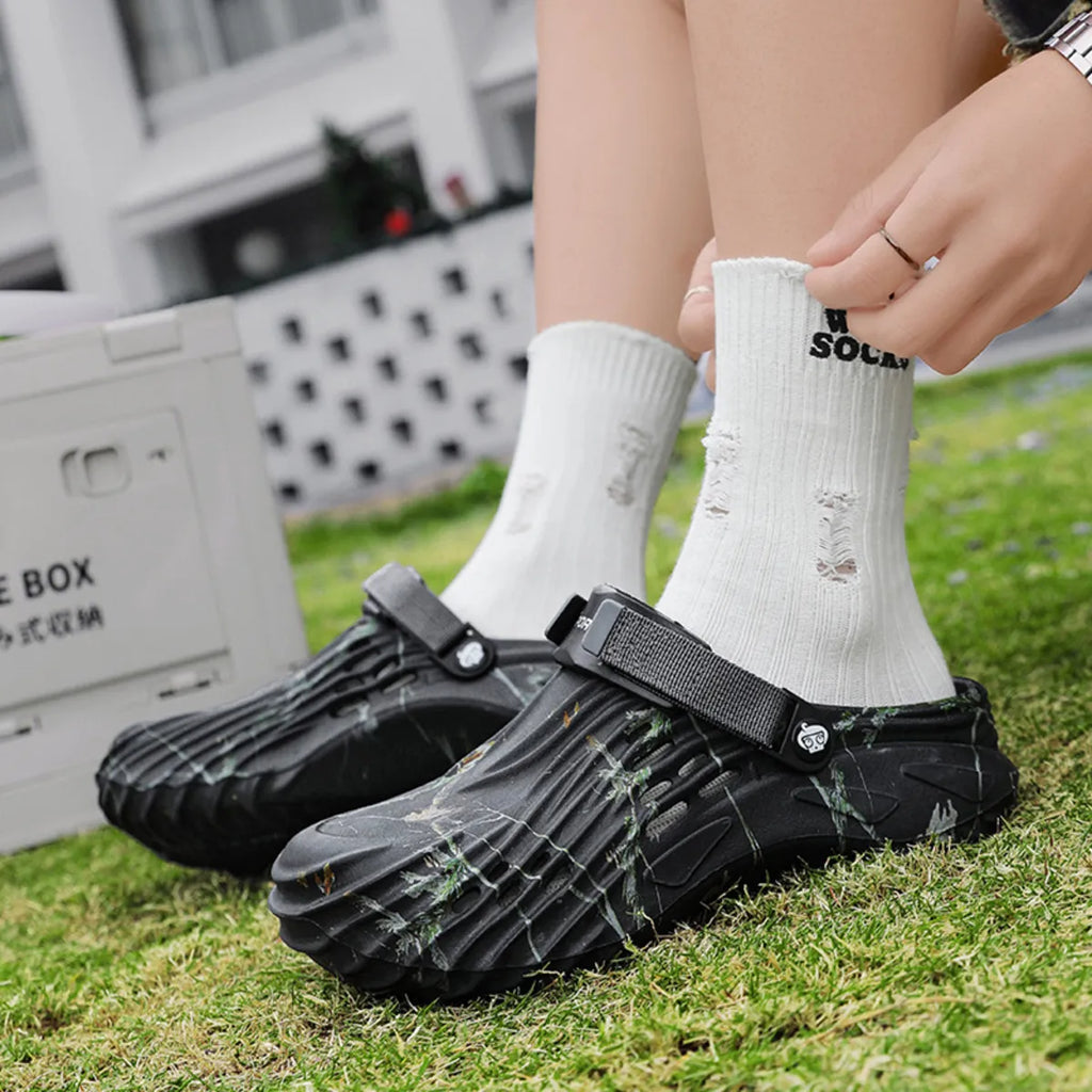 Men's round toe sandals from Trendsi, stylish footwear with comfortable straps and open-toe design.