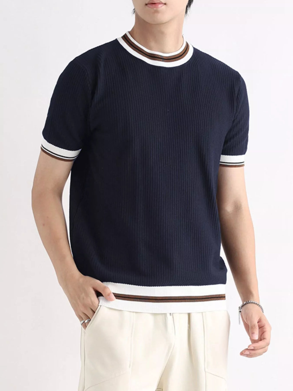 Men's plus size contrast trim shorts sleeve T-shirt from Trendsi, featuring a casual fit and stylish color contrast trim.